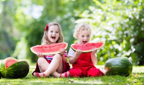 Kids eating watermelon
